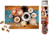 Jigsaw puzzle set with 'Coffee time' theme and a bottle of micro puzzles on a white background