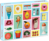 Puzzle box with colorful illustrations of food items with faces on a blue background