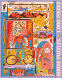 A colorful illustrated jigsaw puzzle box or cover design with the text 'BIRDIE PUZZLES 1,000 PIECES' along the right side. The artwork is highly abstract and cartoonish, featuring a person holding a guitar, a bicycle, a pink archway, stars, and many other whimsical elements in orange, blue, pink, yellow, black, and white.